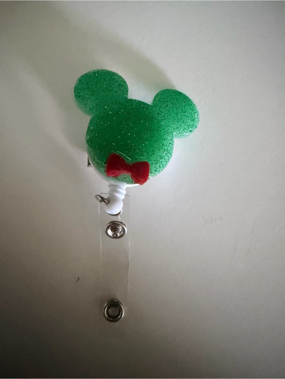 Green Glitter Mouse-Shaped Badge Reel with Red Bow